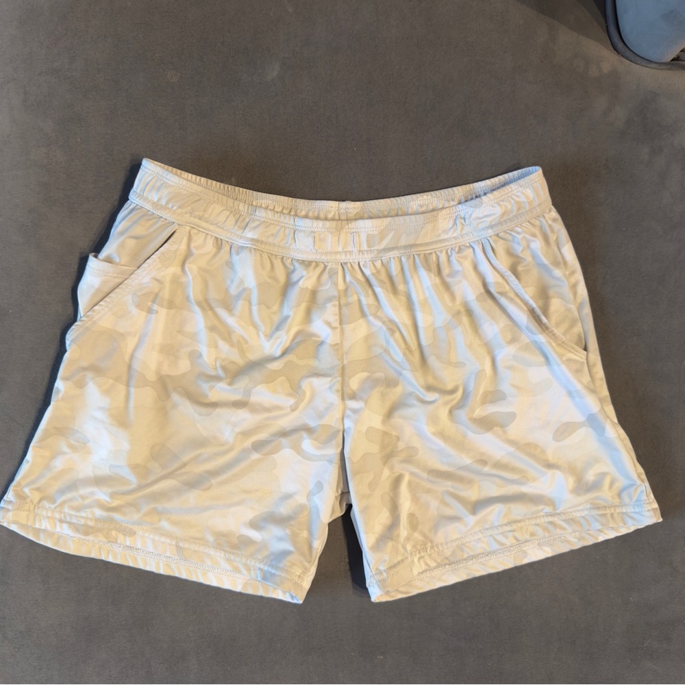 Cream Athletic Shorts with Elastic Waistband and Breathable Fabric